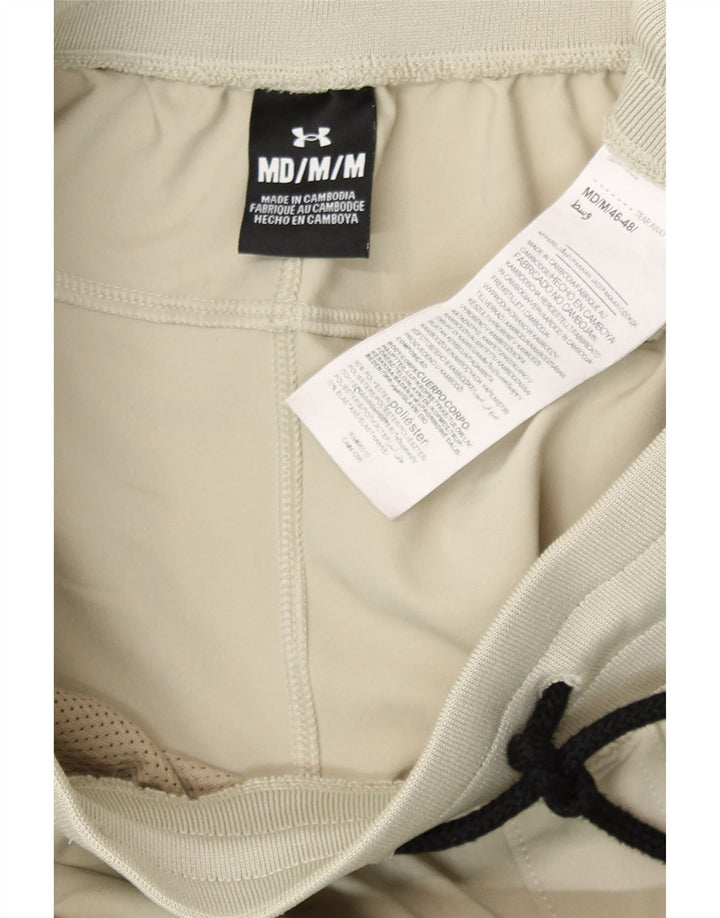 Damskie spodnie dresowe Under Armour Medium W28 L30 w beżowe paski