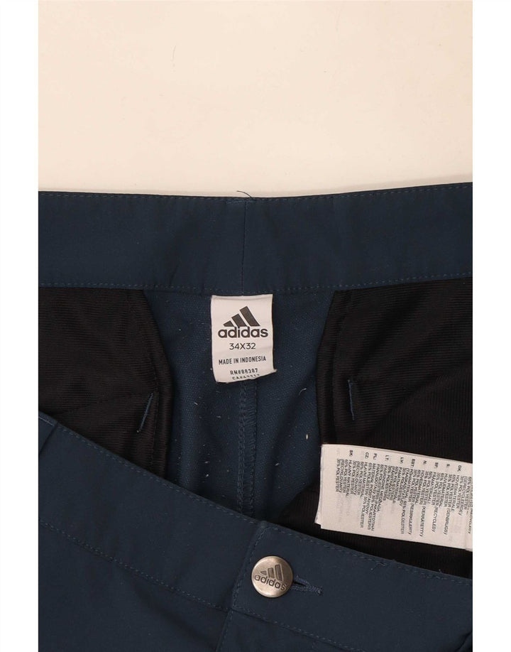 Spodnie męskie Adidas Slim Chino W34 L32 Granatowy poliester