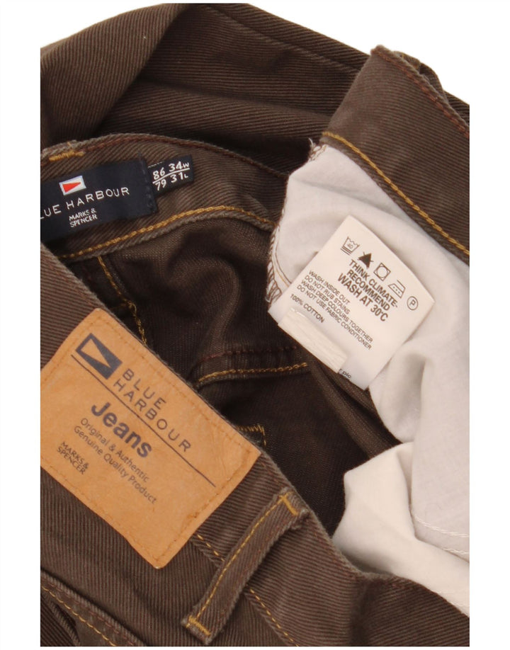 Marks & Spencer Męskie niebieskie dżinsy Harbor Straight W34 L31 Brązowe bawełniane