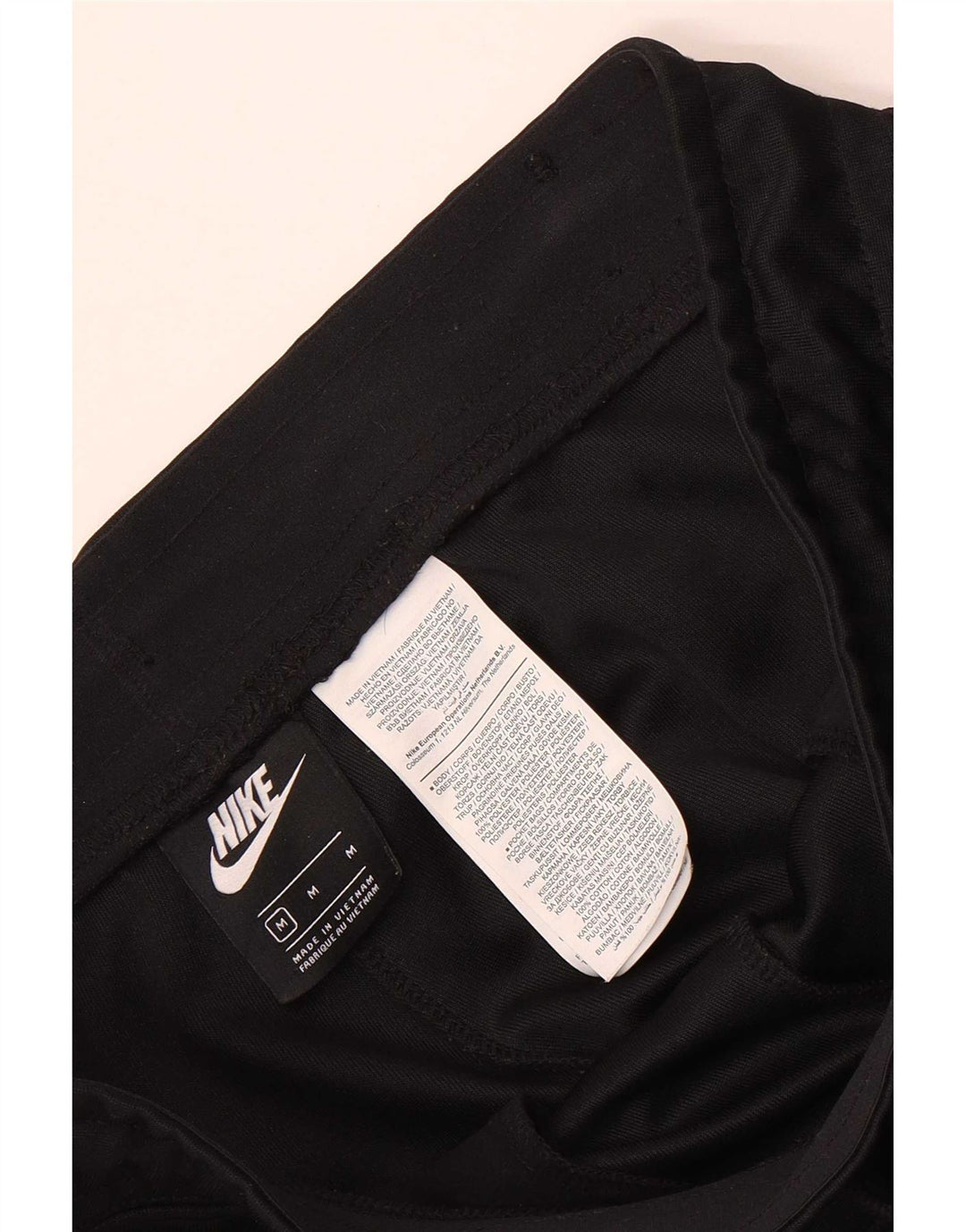 Męskie spodnie dresowe Nike Graphic, joggery, średni czarny poliester