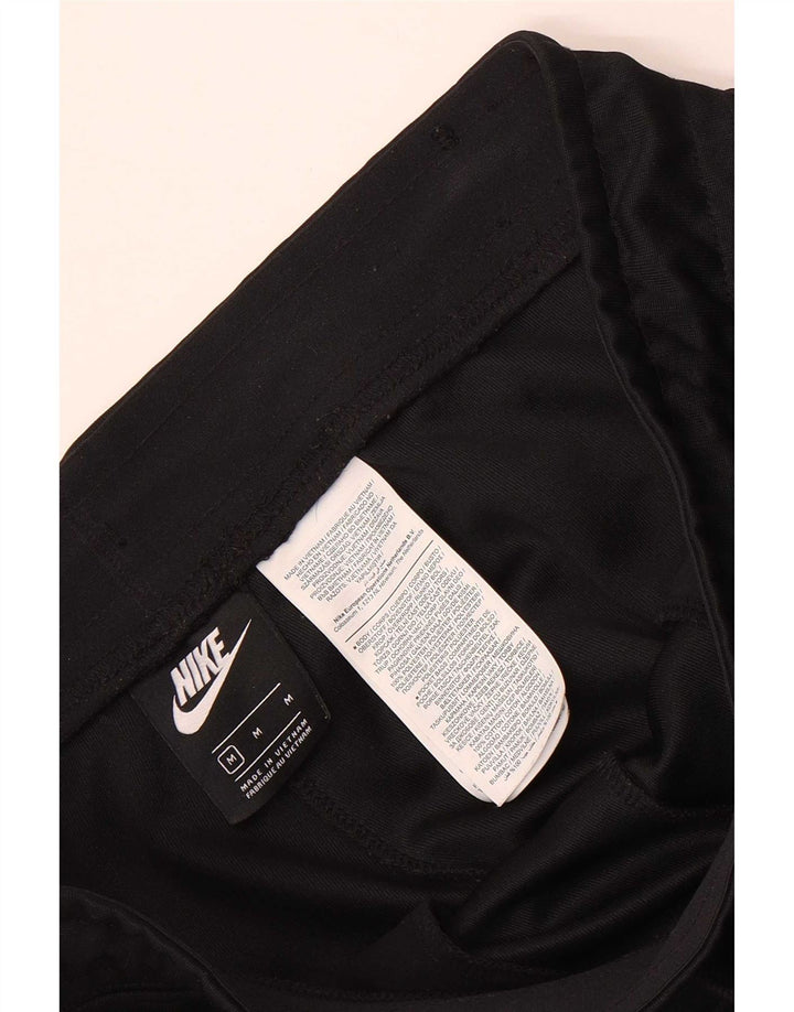 Męskie spodnie dresowe Nike Graphic, joggery, średni czarny poliester