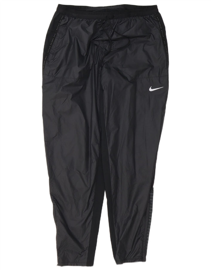 Męskie spodnie dresowe NIKE Storm-Fit, duży, czarny poliester z blokami kolorów