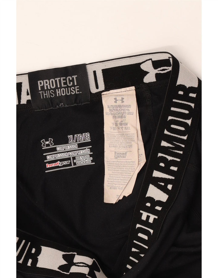 Damskie legginsy UNDER ARMOUR Heat Gear Graphic UK 18 XL w kolorze czarnym