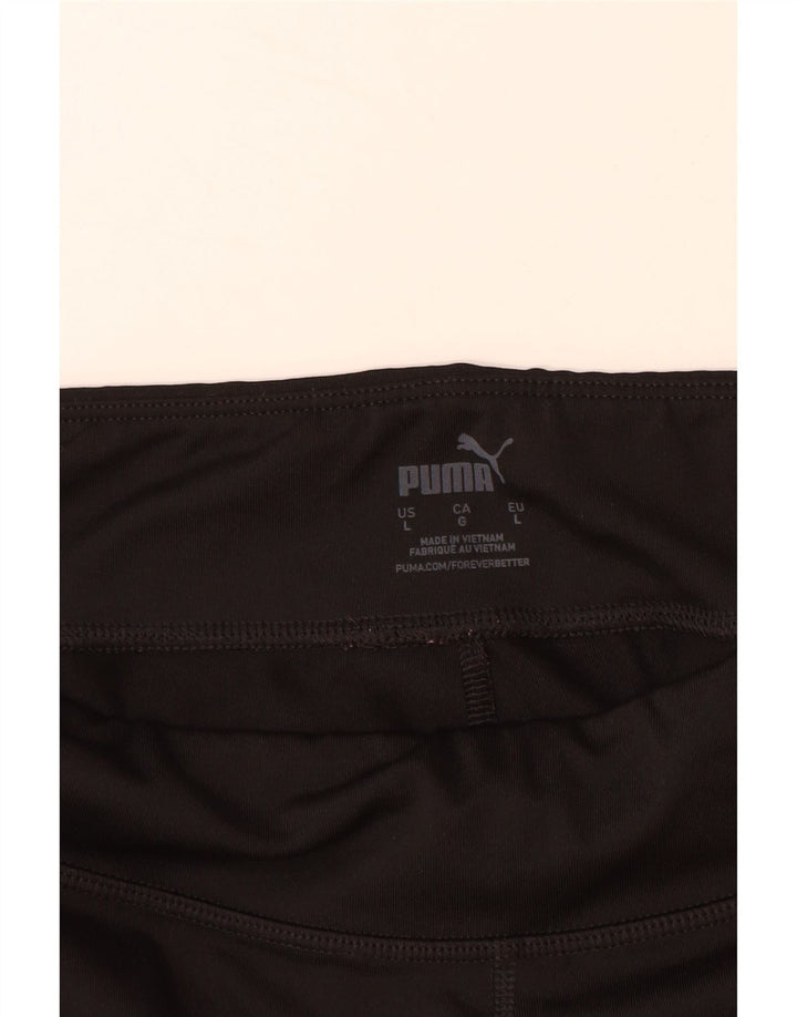 Damskie legginsy PUMA Crop Graphic UK 14, duże czarne bloki kolorów