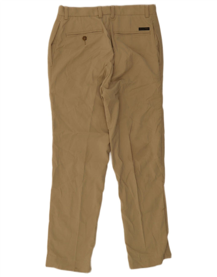 Męskie spodnie typu slim chino Tommy Hilfiger W32 L30 beżowy poliester