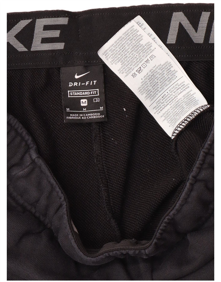 Męskie spodnie dresowe Nike o standardowym kroju Joggery, średnie czarne sportowe