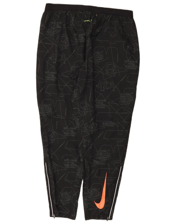 Damskie spodnie dresowe Nike Dri Fit z abstrakcyjnym wzorem UK 18 XL, czarne