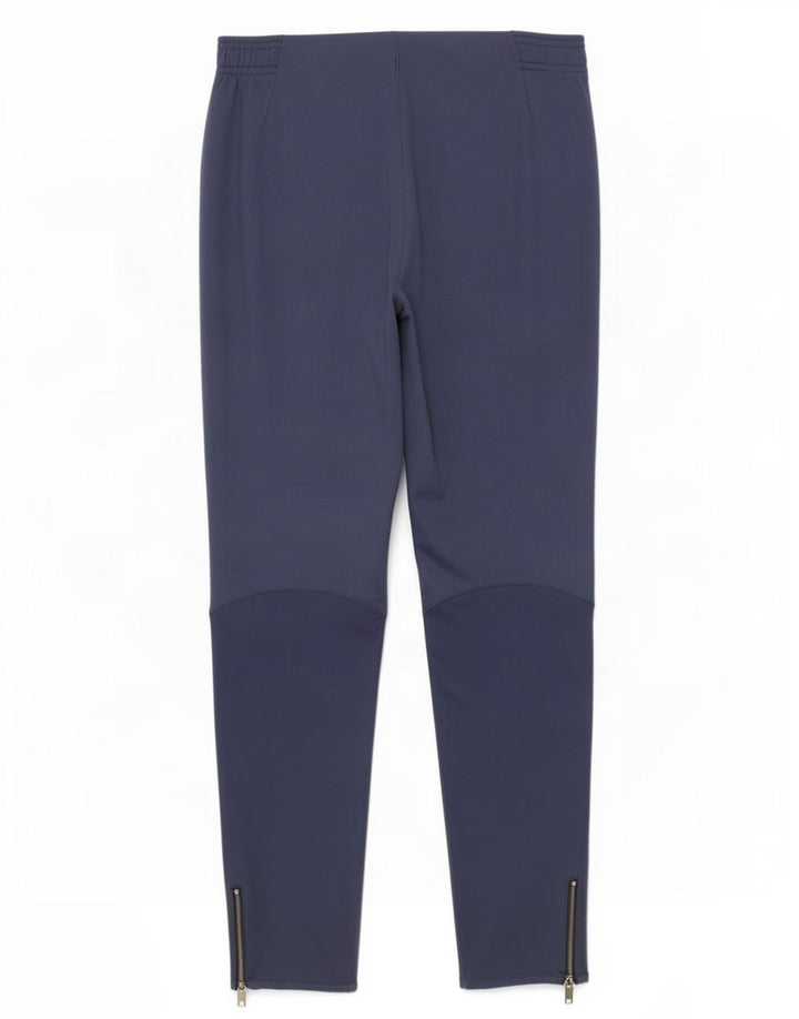 Męskie spodnie dresowe Nike Dri Fit, poliester w kolorze średniego granatu, w blokach kolorów
