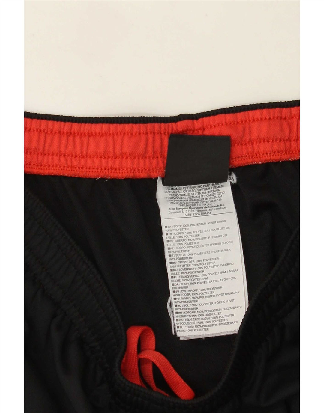 Męskie spodnie dresowe Nike Dri Fit, duży czarny poliester z blokami kolorów