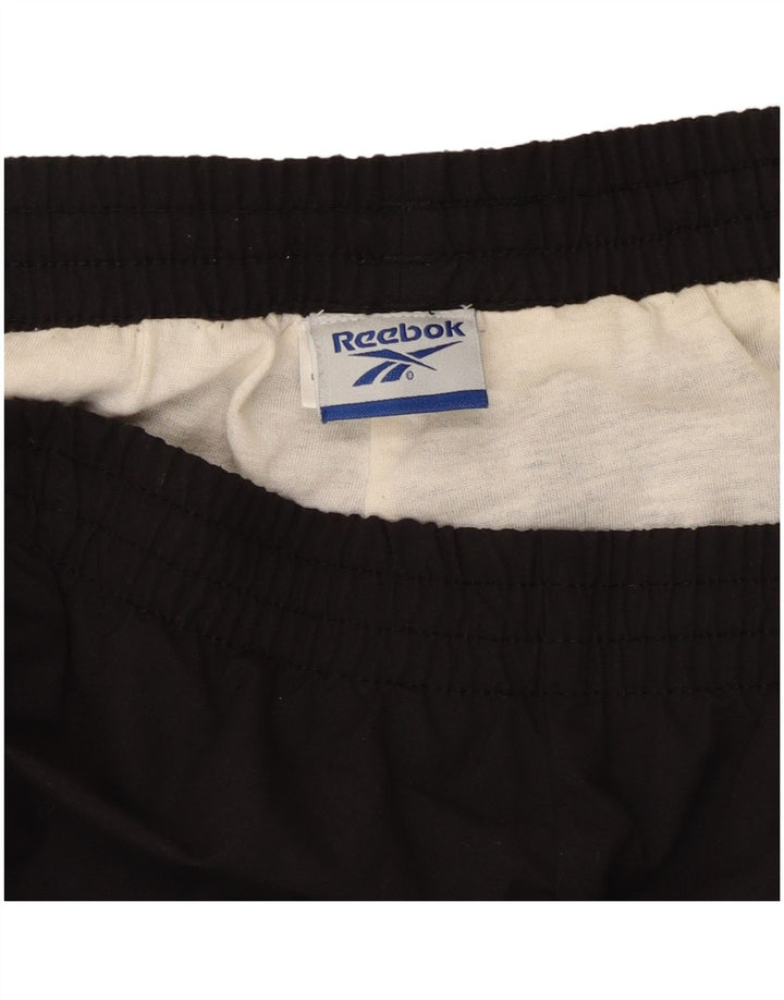 Męskie spodnie dresowe REEBOK, duże, czarne