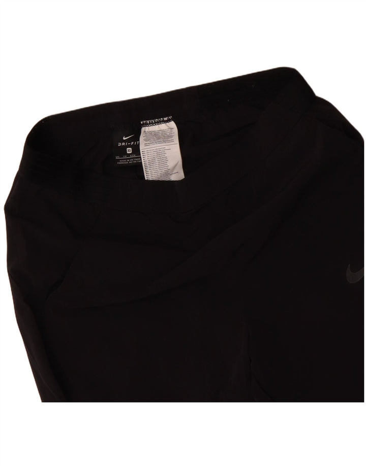 Damskie spodnie dresowe NIKE Dri Fit UK 6 XS, czarny poliester