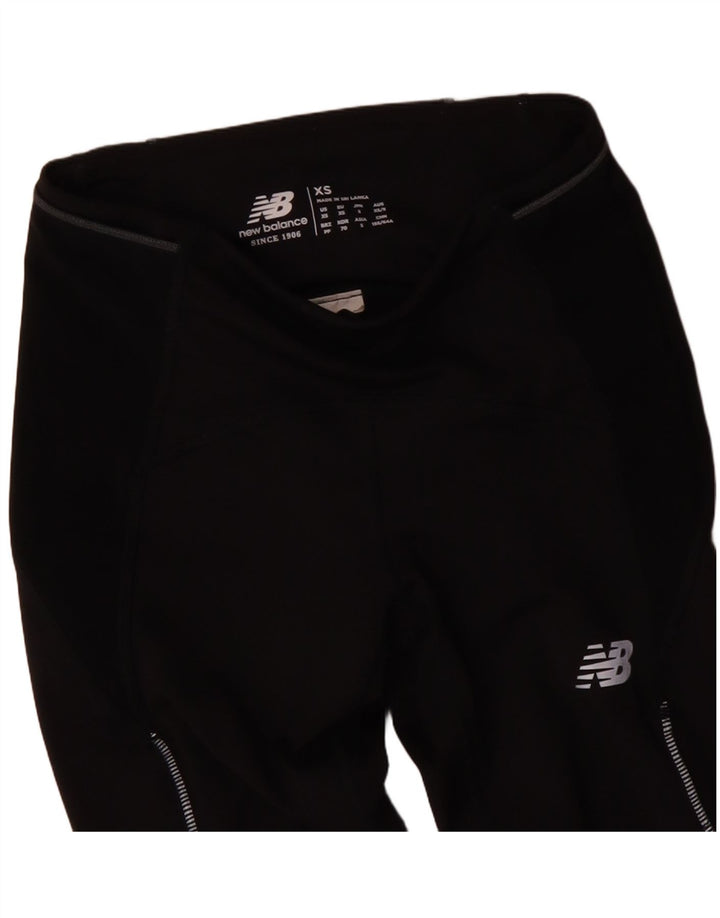 Damskie legginsy z grafiką NEW BALANCE Crop UK 4 XS w kolorze czarnym