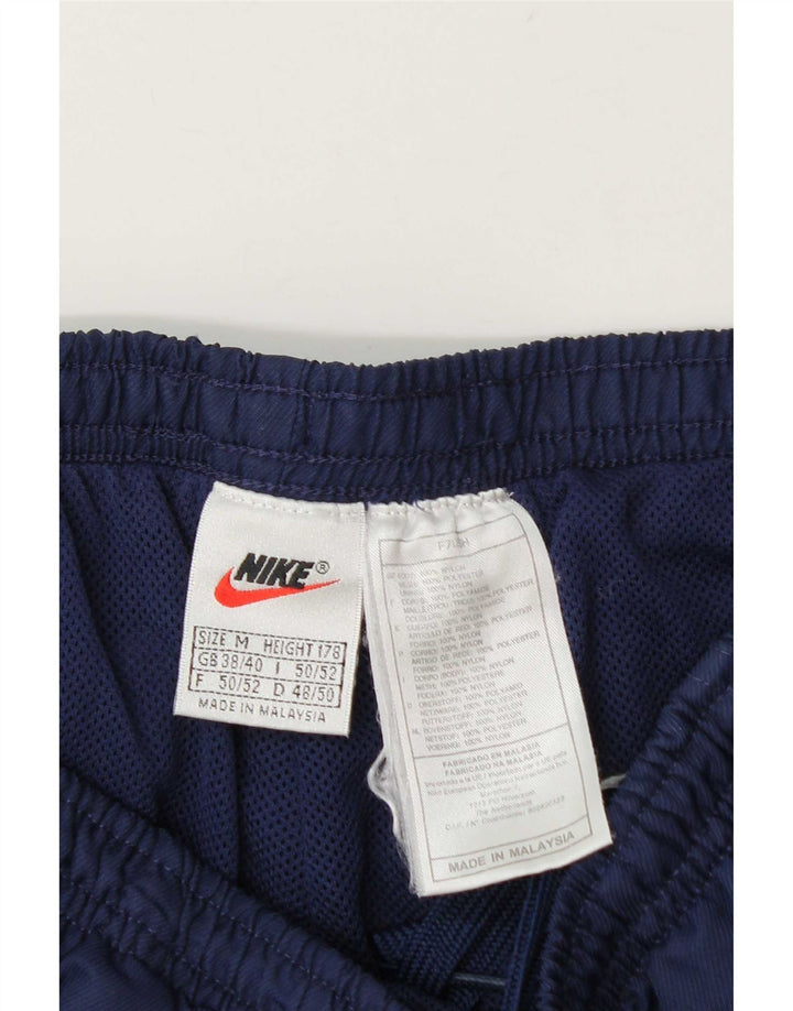 Męskie spodnie dresowe Nike UK 38/40 Średni granatowy nylon