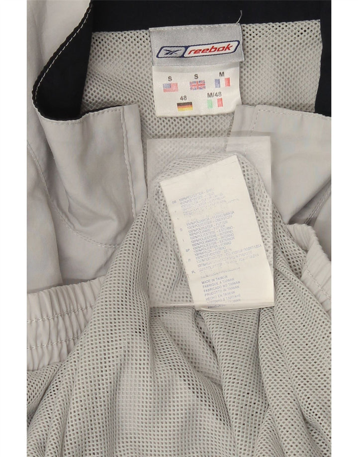 Męska kurtka dresowa Reebok o luźnym kroju, mała, szara, poliester z blokami kolorów