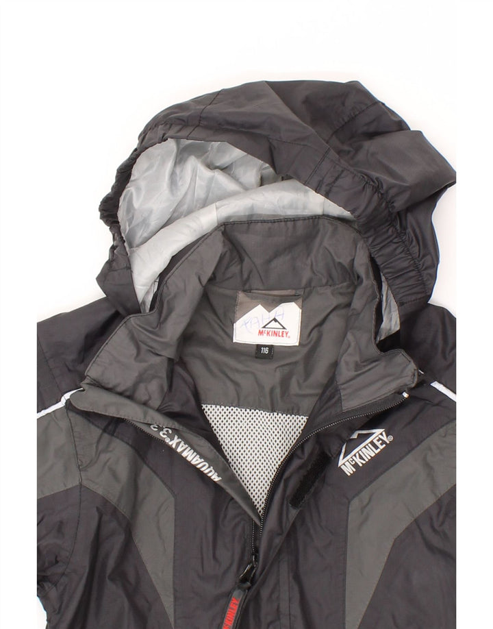 MCKINLEY Boys Hooded Rain Jacket 5-6 Years Black Colourblock Polyamide Vintage McKinley and Second-Hand McKinley from Messina Hembry 