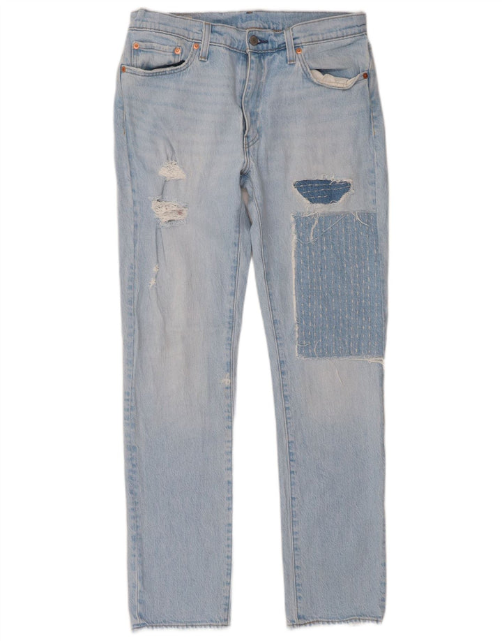 Damskie jeansy Levi's 511 w trudnej sytuacji W33 L32 Niebieska patchworkowa bawełna