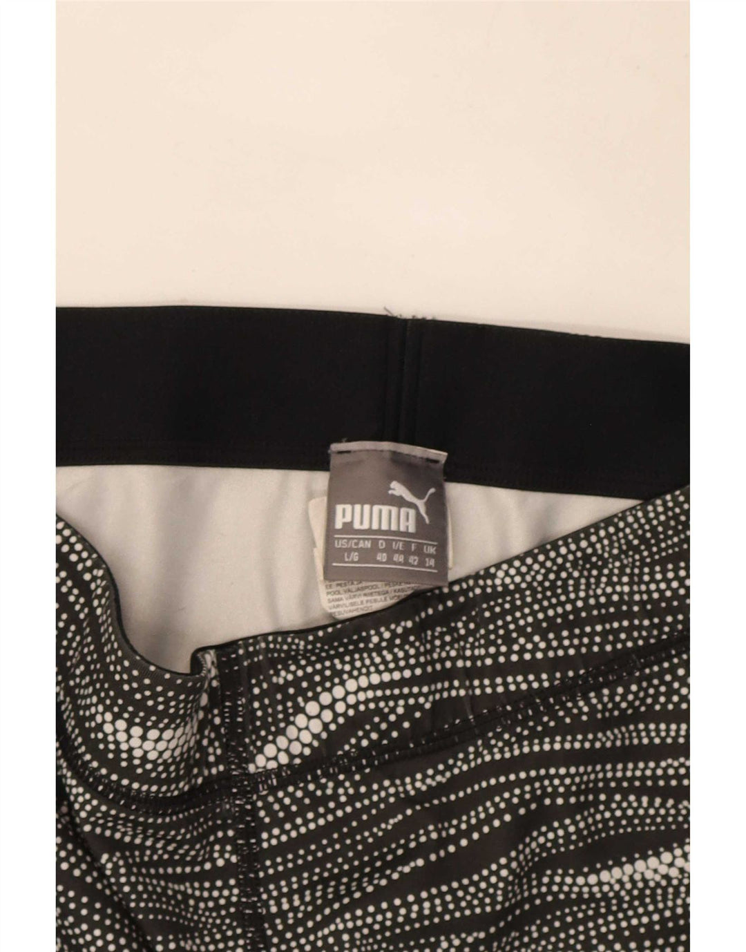 Damskie legginsy Capri Puma UK 14, poliester w średnie czarne paski