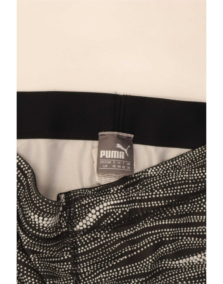 Damskie legginsy Capri Puma UK 14, poliester w średnie czarne paski