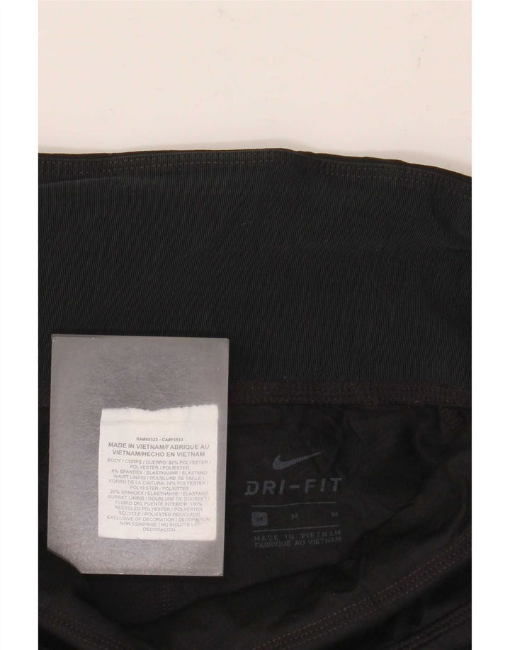 Damskie legginsy Nike Dri Fit UK 12, poliester w kolorze średniej czarnej kolorystyki