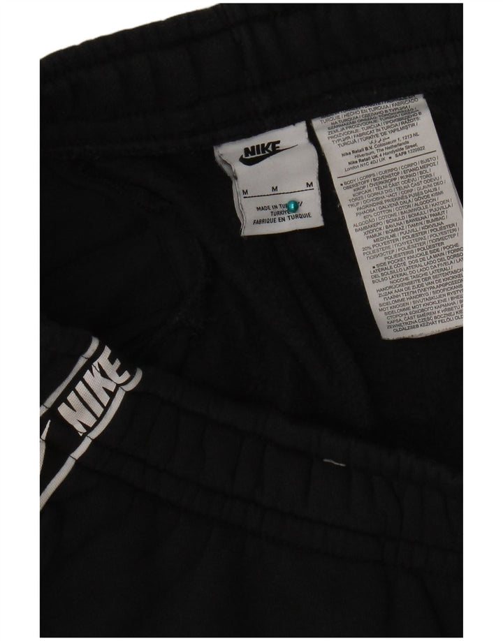 Męskie spodnie dresowe Nike Graphic Joggers, średnia czarna bawełna