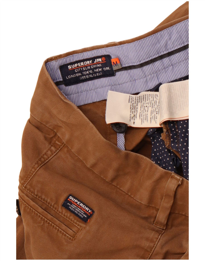 SUPERDRY Męskie wąskie spodnie chino, średnie W32 L31, brązowa bawełna
