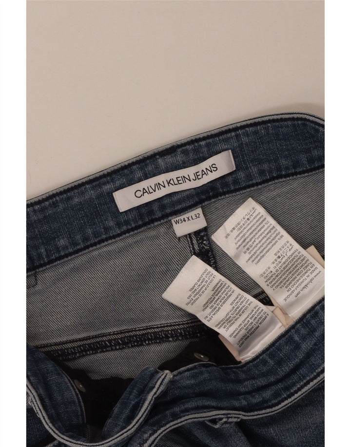 Męskie jeansy obcisłe Calvin Klein W34 L27 Niebieskie bawełniane