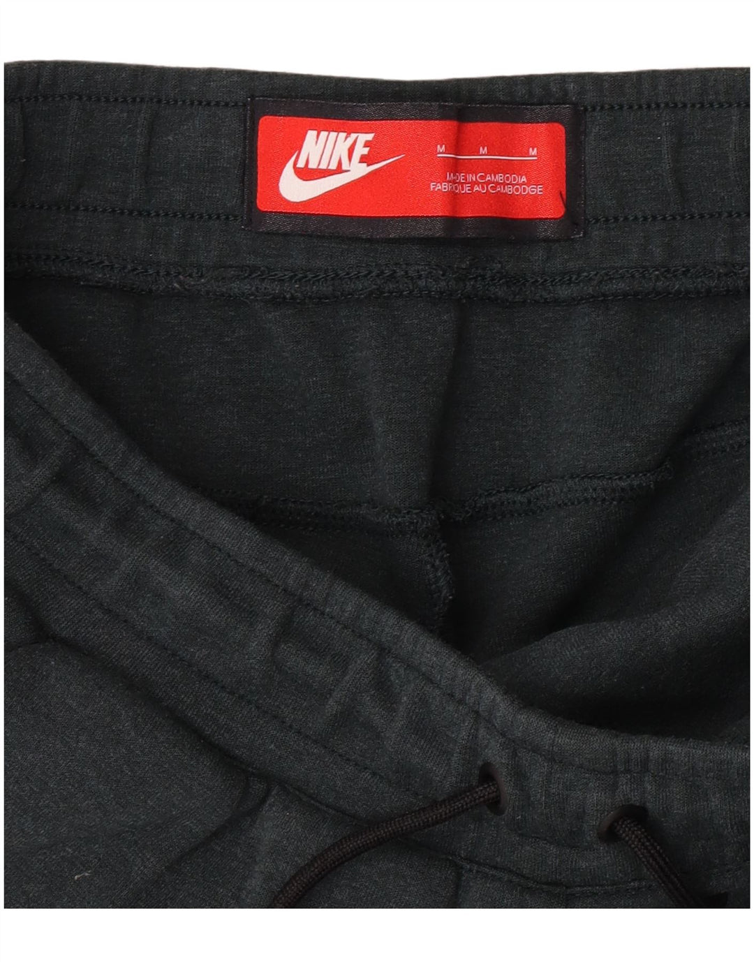Męskie spodnie dresowe Nike, średnio zielone