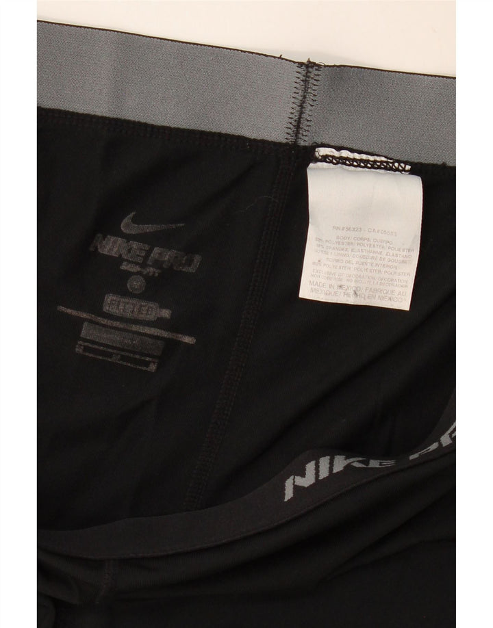 Damskie spodnie dresowe Nike Dri Fit UK 12, średni czarny poliester