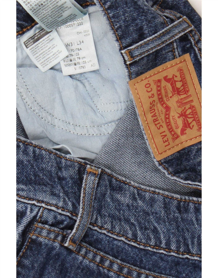 Damskie jeansy Levi's z bardzo niską szeroką nogawką W31 L34, niebieska bawełna