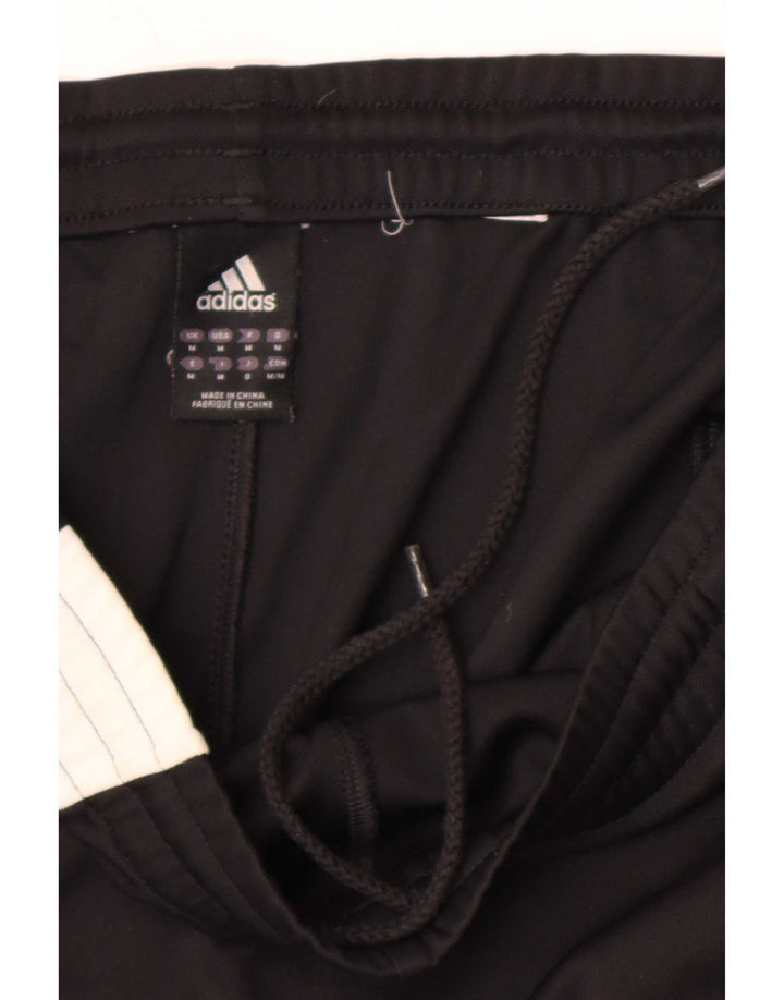Męskie spodnie dresowe Adidas Graphic, średnio czarne, z blokami kolorów