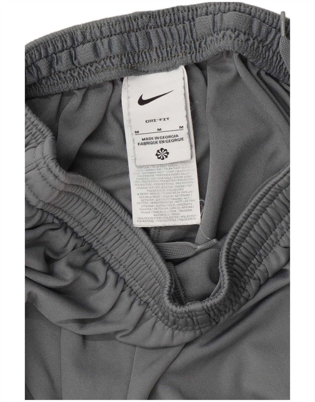 Męskie spodnie dresowe Nike Dri Fit, poliester w kolorze średniej szarości