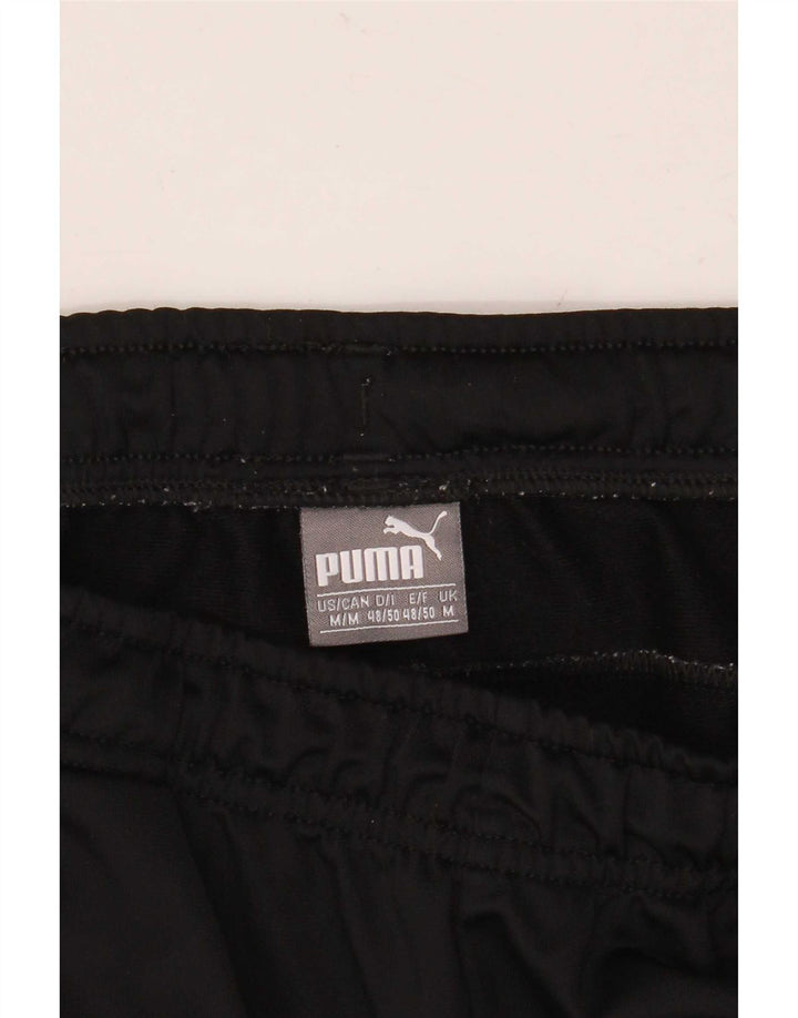 Męskie spodnie dresowe Puma, joggery, średnie czarne