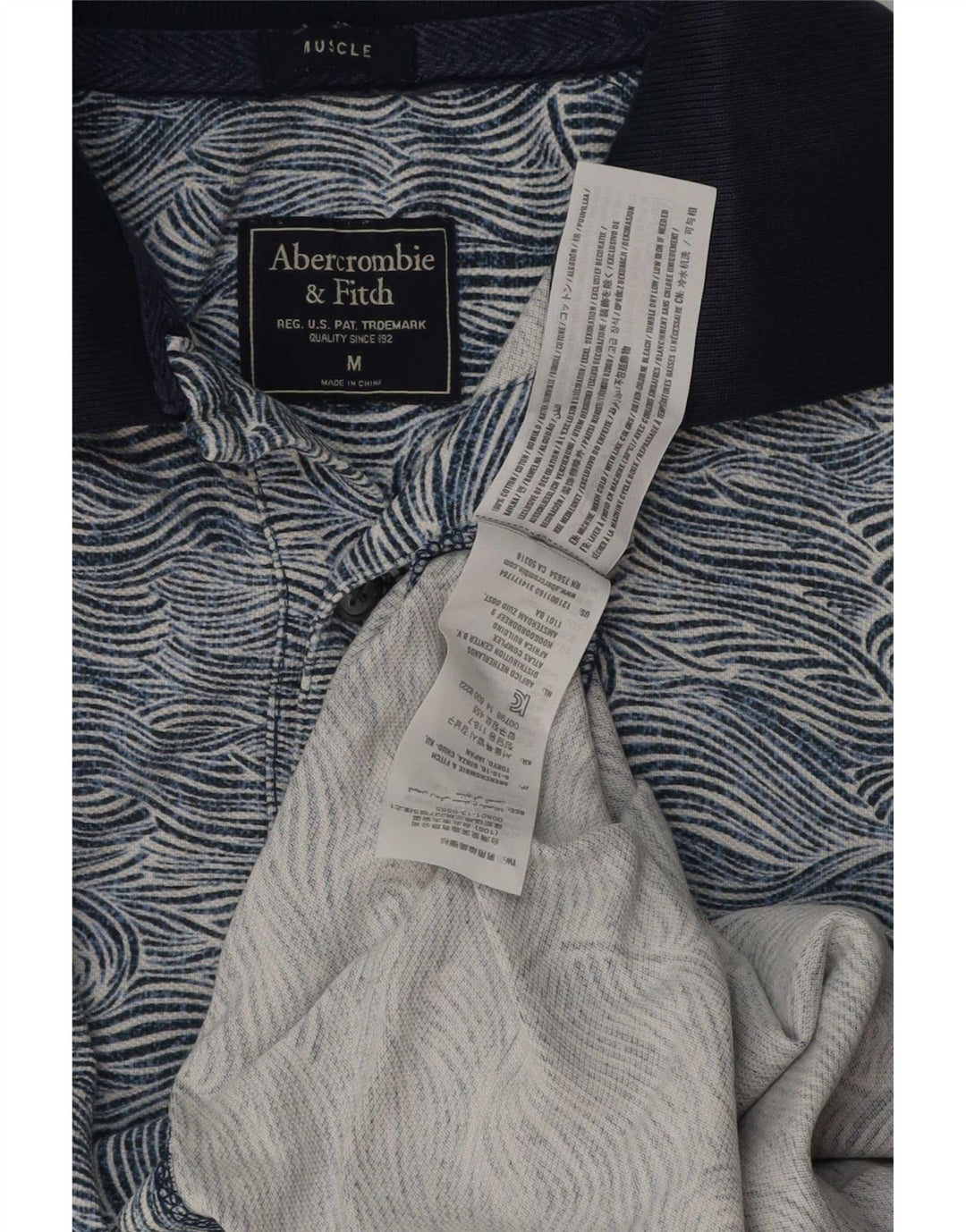 Męska koszulka polo Abercrombie & Fitch z abstrakcyjnym wzorem, kolor średni niebieski