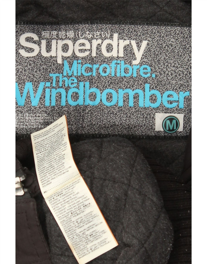 Damska kurtka wiatrówka z kapturem Superdry The Windbomber UK 14, średnia czarna