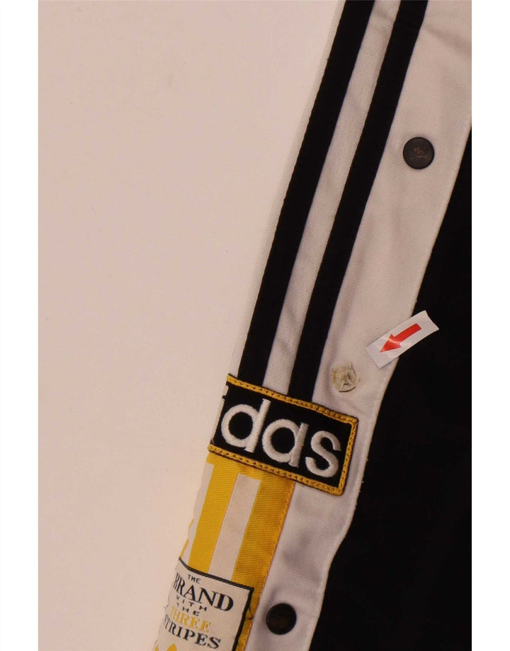 Męskie spodnie dresowe Adidas z grafiką, średni czarny poliester z blokami kolorów