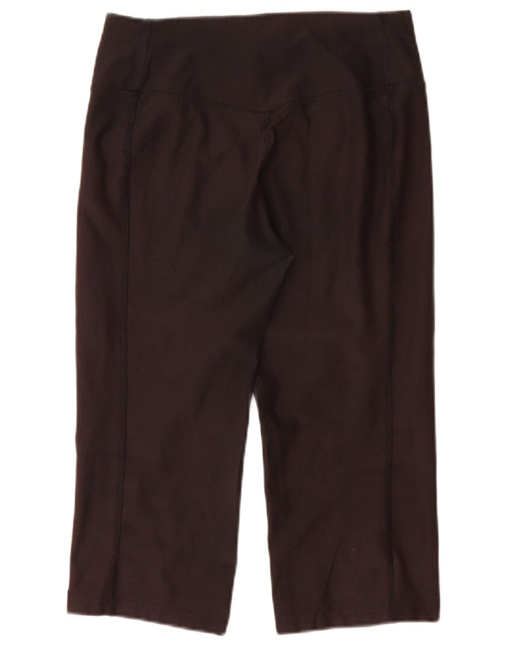 Damskie legginsy Nike Dri Fit Capri UK 12, średni czarny poliester