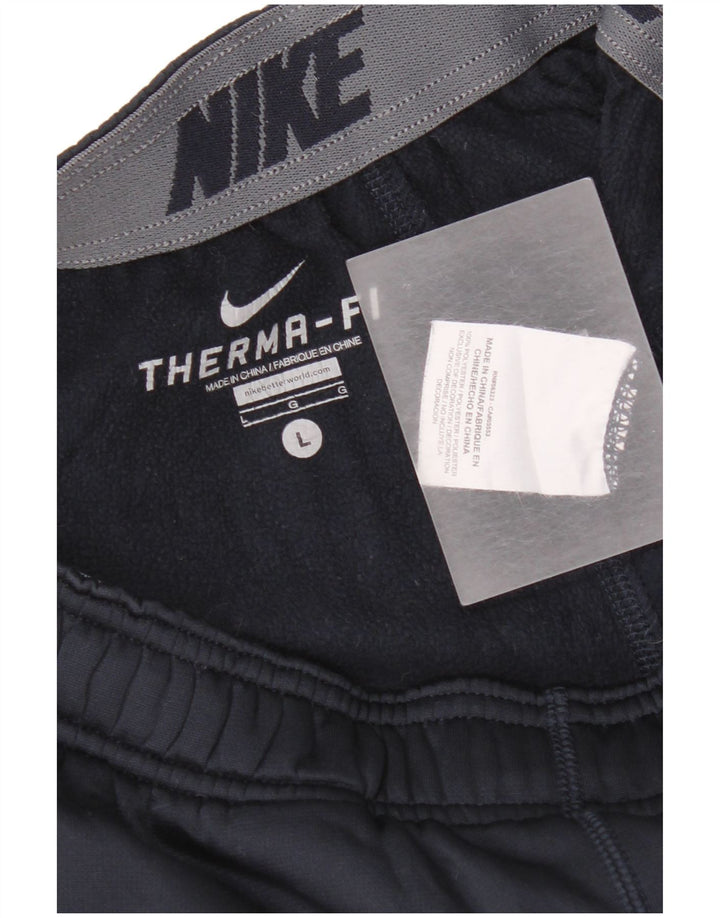 Męskie spodnie dresowe Nike Therma-Fit, duże, granatowe, z poliestru