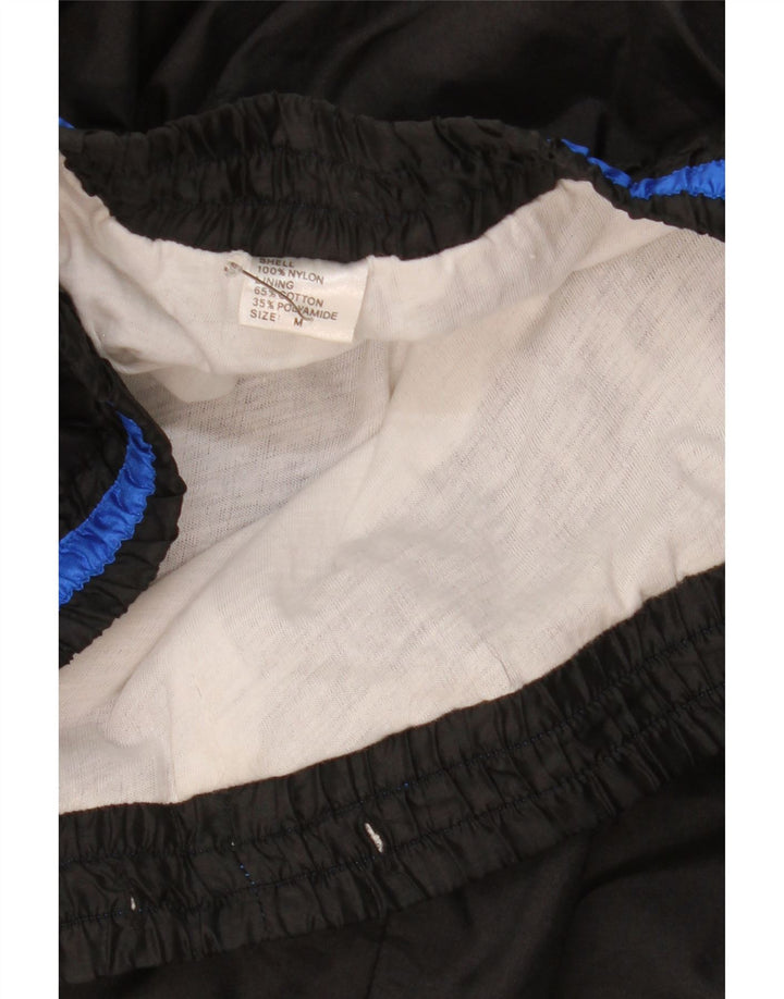 Męskie spodnie dresowe w stylu vintage Joggery Średni czarny nylon w blokach kolorystycznych