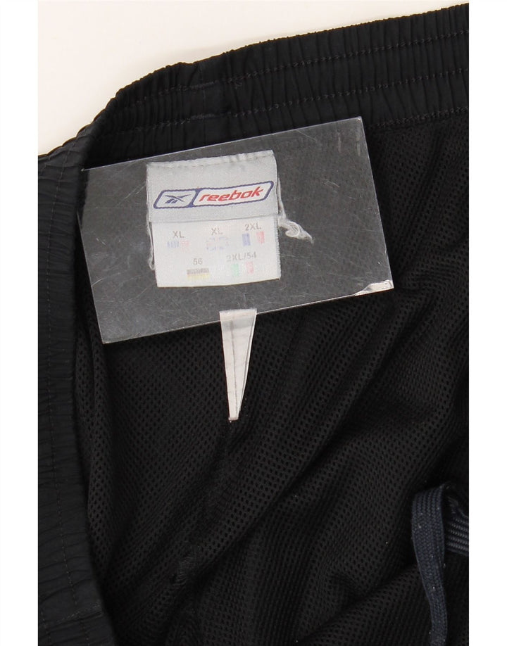 Męskie spodnie dresowe REEBOK XL czarne