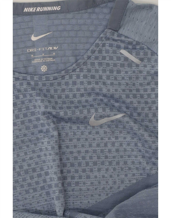 Damska koszulka Nike Dri Fit Top UK 14, średni niebieski, geometryczny poliester