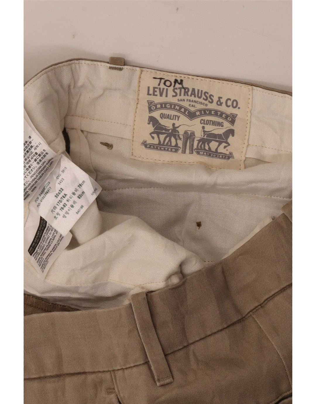 Męskie spodnie typu slim chino Levi's W30 L32 beżowa bawełna