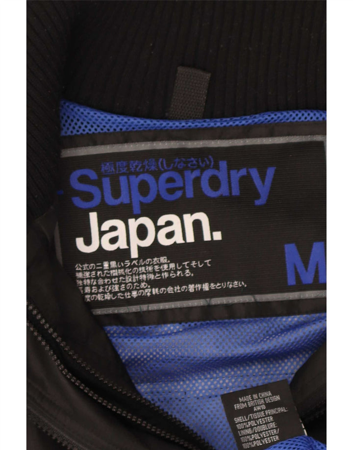 Damska kurtka przeciwdeszczowa Superdry Graphic UK 14, średnia czarna