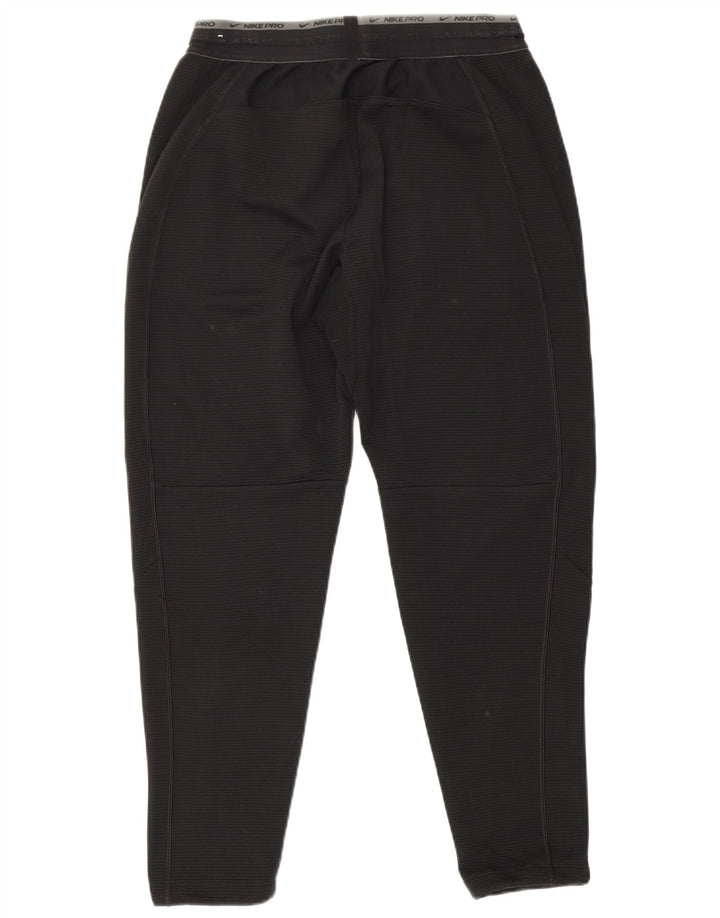 Męskie spodnie dresowe Nike Dri Fit Graphic, średni czarny poliester
