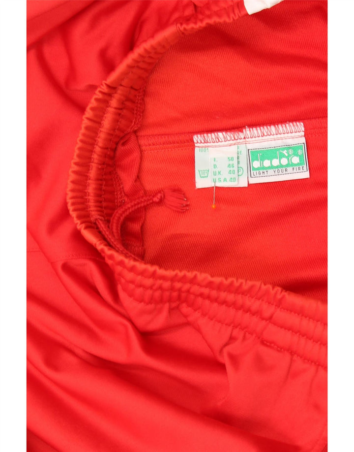 Męskie spodnie dresowe DIADORA z grafiką UK 40 w kolorze średniej czerwieni