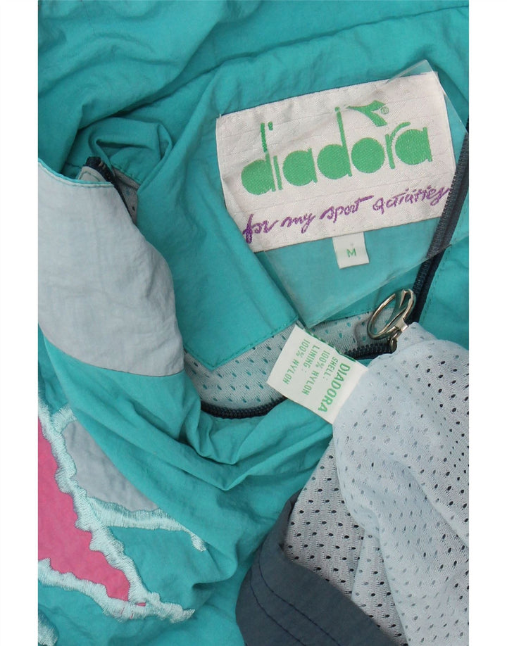 Męska kurtka dresowa DIADORA o luźnym kroju, nylon w kolorze średnioniebieskim