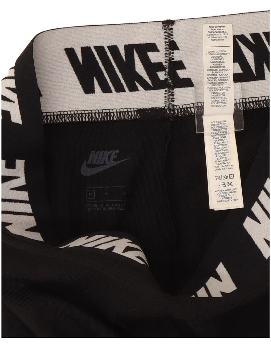 Damskie legginsy Nike Graphic UK 12, średnie czarne, bawełniane