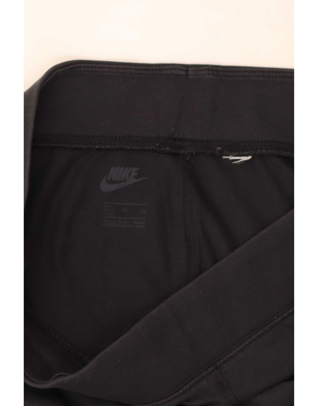 Damskie legginsy Nike Graphic UK 6 XS w kolorze czarnym