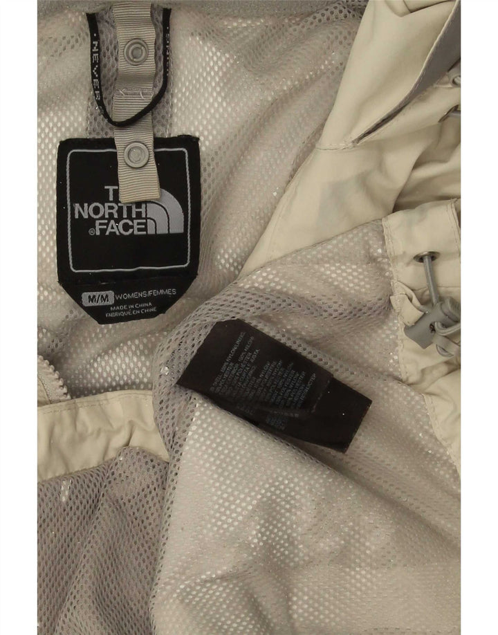 Damska kurtka przeciwdeszczowa z kapturem The North Face UK 14, nylon w kolorze średnio zielonym