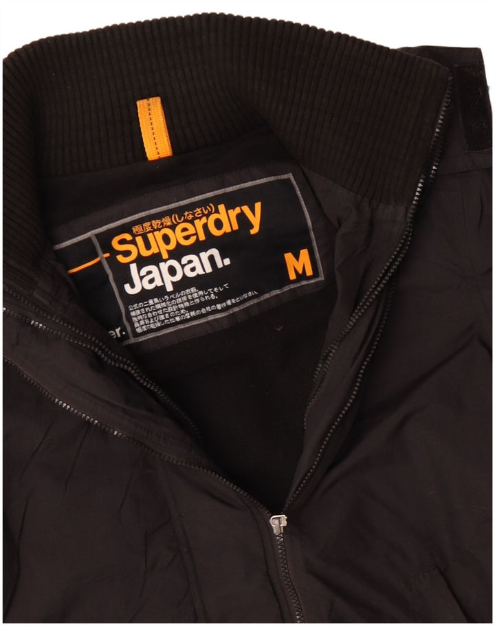 SUPERDRY Męska kurtka wiatrówka z kapturem UK 38, średni czarny poliester