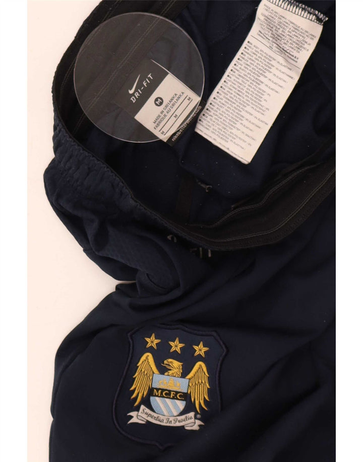 Męskie spodnie dresowe Nike Manchester City, średni granatowy poliester